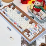 Whimsical Christmas Whispers PBT keycaps set, featuring the 'Christmas Whispers' 120-key variant with enchanting winter wonderland motifs and crisp, durable legend.