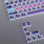 Different angles of the stunning Cosmic Code Crystal MDA Keycap Set, revealing 3D cosmic patterns in transparent crystal with sci-fi depth.