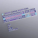 A stunning close-up of the Cosmic Code Crystal MDA Keycap Set, showcasing its mysterious 3D cosmic patterns within transparent crystal from various angles.