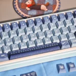 Vintage Cowboy PBT keycaps set, shown from multiple angles, reveal their durable PBT texture, authentic retro style, and rustic Americana charm.