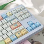 A playful gallery of vibrant Crayon Shin-chan PBT keycaps set, showcasing the durable anime theme set from various angles for mischievous keyboard customization.