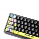 Dynamic angles of Cyberpunk Rebecca Keycaps Set, highlighting side-engraved PBT legends with vibrant neon backlighting and intricate futuristic circuitry.
