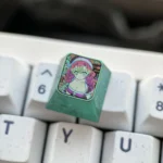 Premium titanium Mitsuri Kanroji Demon Slayer keycap gallery, showcasing its vibrant pink and green artisan design and metallic finish from multiple angles.