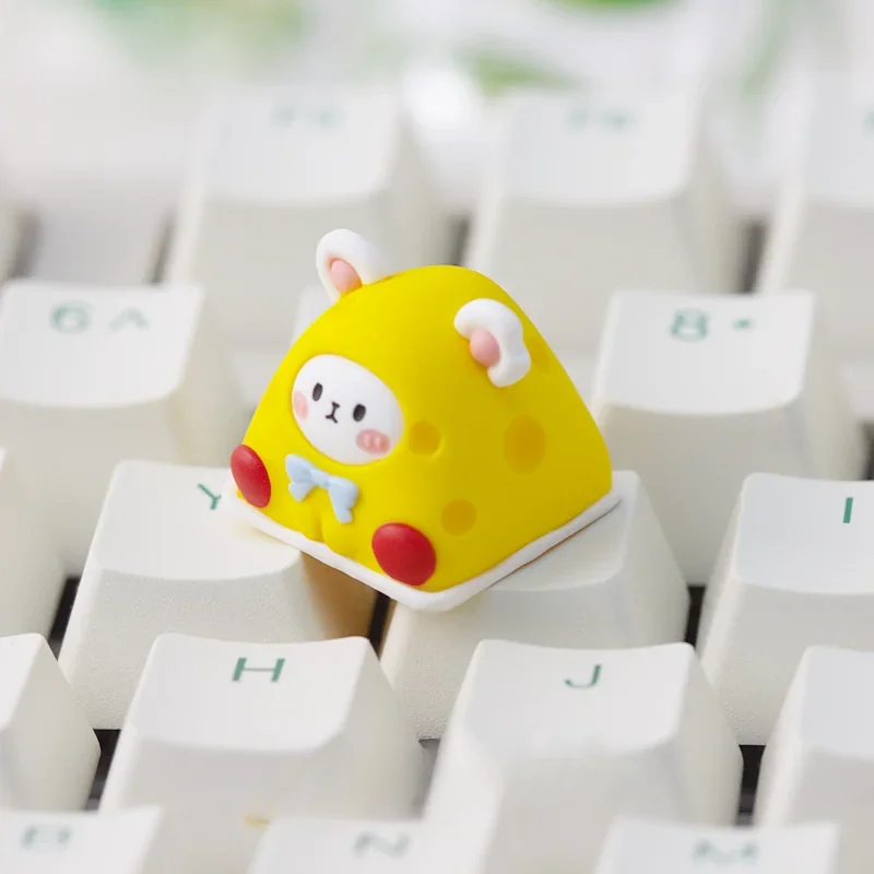 Close-up side view of the whimsical dessert mice artisan keycap, showcasing its intricate layered resin and adorable miniature mouse detail.