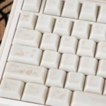 Ethereal Dream Butterfly PC Cherry keycaps set, soft milky white with delicate butterfly motifs. Views show durable PC, Cherry profile, and artistic dream butterfly design.