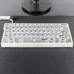 EVA Asuka translucent PC keycaps set showcasing futuristic anime aesthetic with ethereal glow and vibrant character accents from various angles.