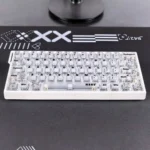 Artistic EVA Asuka translucent PC keycaps set glowing with a futuristic anime aesthetic, highlighting the iconic character's vibrant accents.