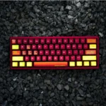 Close-up of vibrant Evangelion keycaps set, showcasing durable dye-sub PBT legends and bold mech designs from a unique angle.