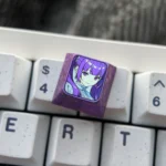 Frieren Titanium Artisan Keycap showcased from different angles, revealing exquisite Frieren-inspired designs, vibrant anodized colors, and luxurious design.