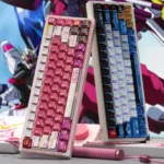 An angled view of the ZGMF-X09A Justice Gundam backlit keycap set, revealing its iconic futuristic mecha design with vibrant, premium glowing details.