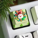A collection of detailed views showcasing the handcrafted Christmas resin ESC keycap, featuring whimsical 3D miniature festive scenes and vibrant holiday themed.