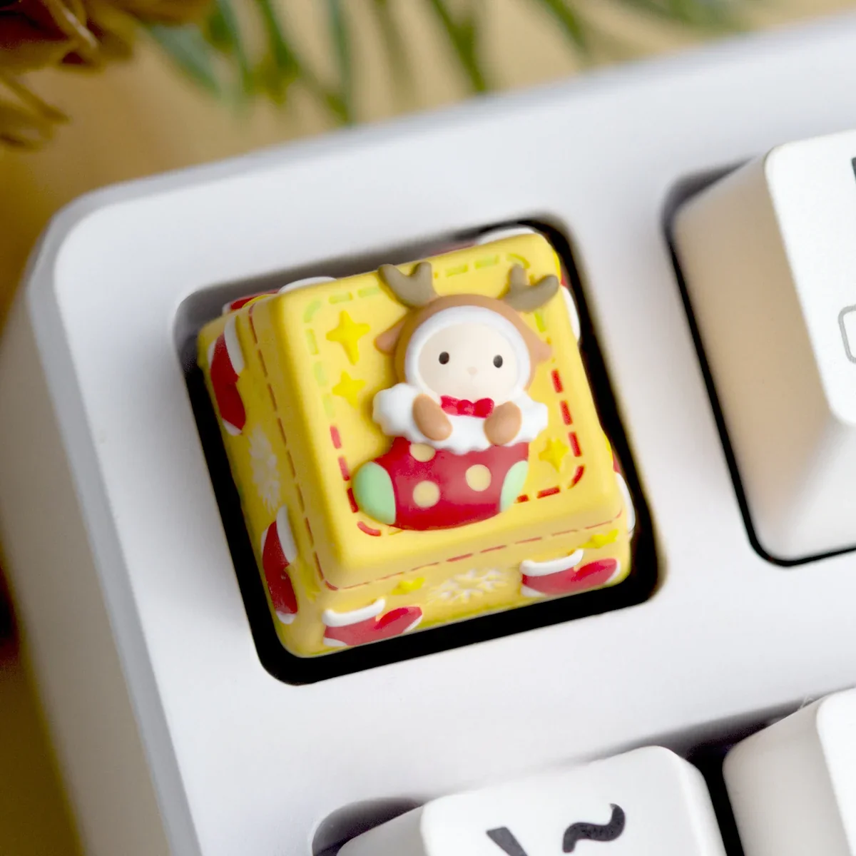 Handcrafted Christmas keycap, a whimsical 3D resin sculpture. Vibrant holiday colors and festive scenes are shown from multiple angles.