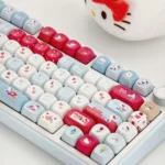 Iconic Hello Kitty Happy Travel Diary PBT dye-sub keycaps set, a premium set with whimsical pastel travel themes and diary-inspired details.