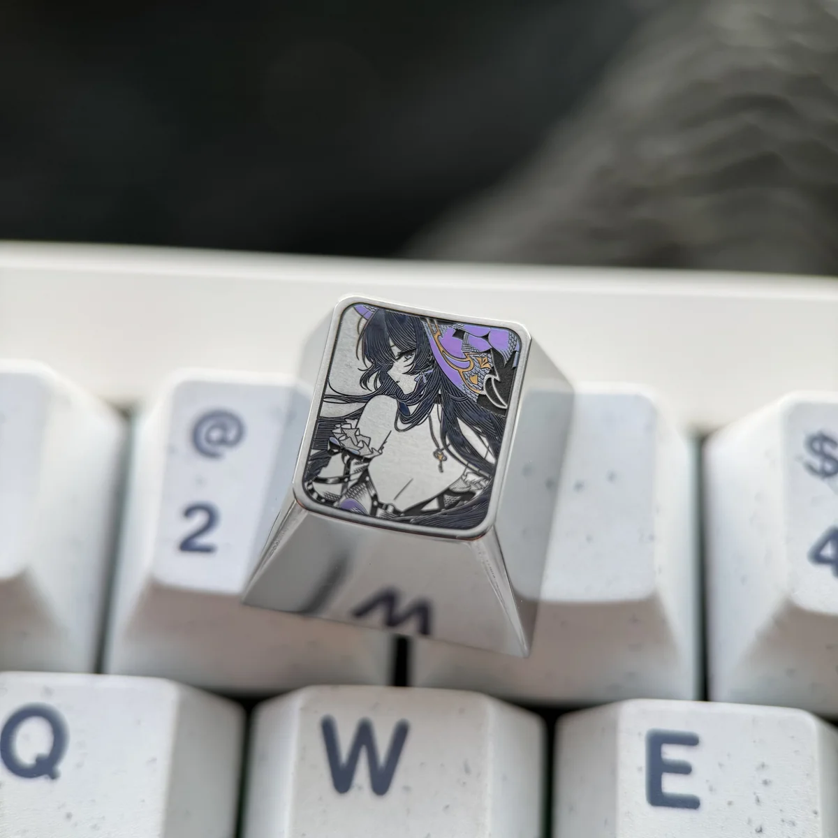 Honkai Star Rail Herta titanium keycap. Intricate character, metallic sheen, precision color, various angles, for sci-fi elegance.