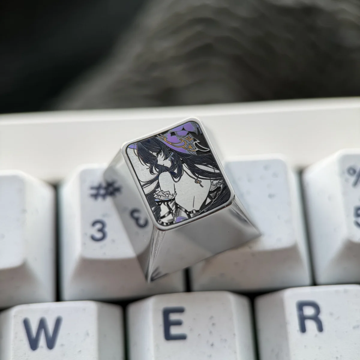 Premium Honkai Star Rail Herta titanium artisan keycap for R4 ESC height, intricately precision-colored with metallic sheen, embodying sci-fi elegance.