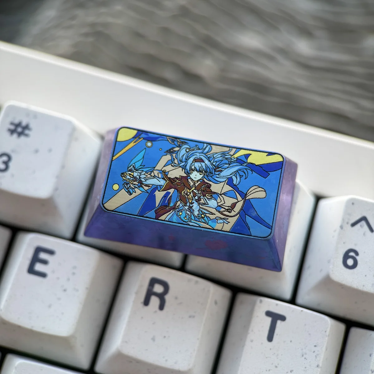Exclusive Honkai Star Rail Firefly Titanium Artisan Keycap. Vibrant anime character art on this premium 1.75U metallic Caps Lock keycap reflects futuristic art.