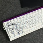 Isabelle Keycaps Set gallery: elegant side-printed RGB PBT set with original character art, seen from multiple angles, showcasing subtle backlighting.