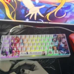Kamio Misuzu AIR side-print backlit PBT keycaps set, showcasing various angles of their serene skies and gentle wing art, with clear, illuminated legends.
