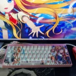 A gallery view of Kamio Misuzu AIR side-print backlit PBT keycaps set, displaying their delicate design and serene, winged motifs from various angles.