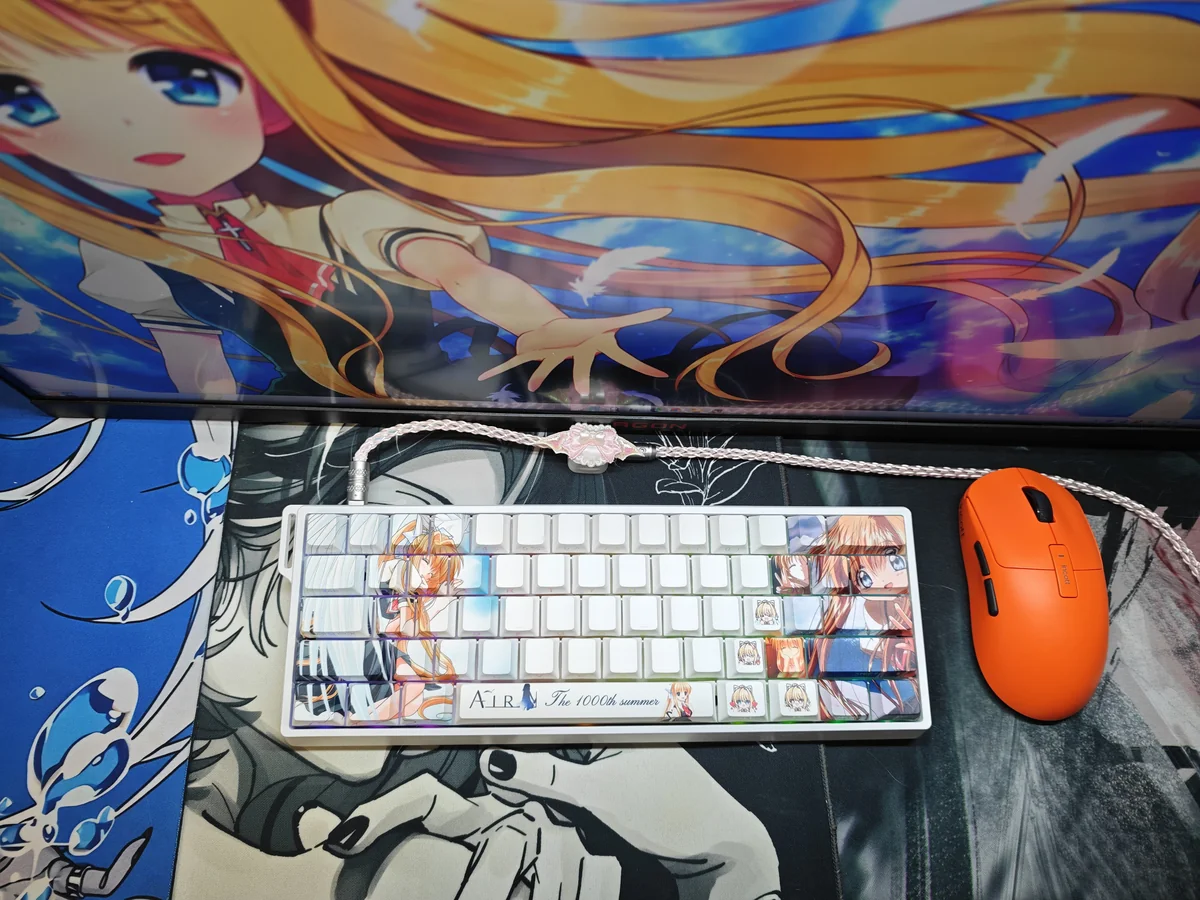 Kamio Misuzu AIR side-print backlit PBT keycaps set on a keyboard, featuring serene anime designs and a gentle glow.