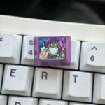 Multiple angles of the Kurumi Tokisaki titanium keycap, showcasing vibrant anime art and the premium metallic finish. A durable Date A Live collections.