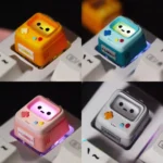 Handcrafted LOBO Vintage Console Artisan Gaming ESC Keycap, a luminous translucent resin art piece mimicking a vibrant miniature retro gaming console.