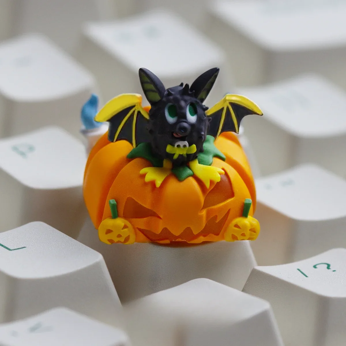 Handcrafted luminous resin Halloween ESC keycap showcasing detailed pumpkin designs from multiple angles, glowing playfully in translucent material.
