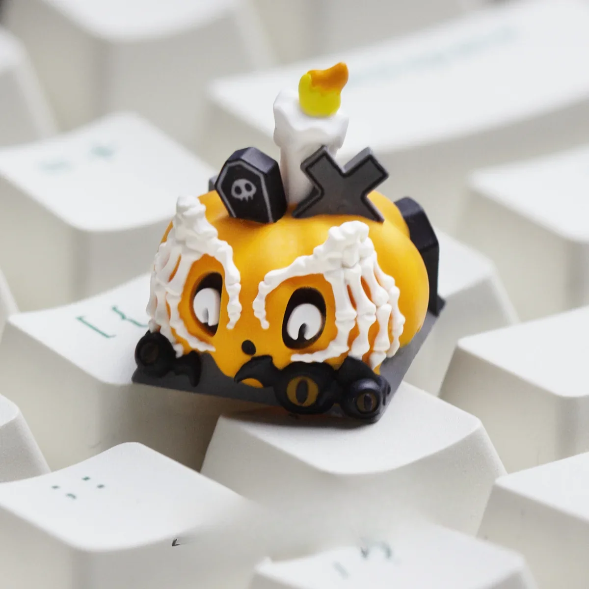 Handcrafted luminous resin Halloween ESC keycap featuring a charming skull-pumpkin design, perfect for a spooky yet playful keyboard.