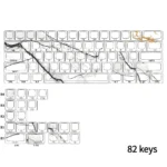 Elegant gallery of side-lit PBT marble keycaps set, showcasing side-engraved legends, natural texture, and subtle backlighting from various angles.