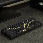 Close-up gallery of elegant Black Gold Marble PBT keycaps set, showcasing the luxurious side-engraved legends and natural stone aesthetic from multiple angles.