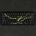 Elegant Black Gold Marble PBT keycaps set, showcasing luxurious side-engraved legends and a premium stone aesthetic.
