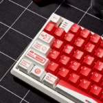 Marlboro F1 Racing PBT Gaming Keycap Set, bold red and white F1 design from multiple angles, highlighting durable PBT for premium gaming.