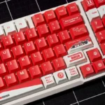 Marlboro F1 Racing PBT Gaming Keycap Set, different angles highlighting the iconic red and white F1 theme and durable PBT. Enhanced for gaming.
