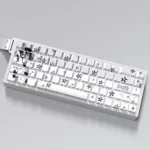 A collection of artistic product shots highlighting Megumi Kato side-print backlit PBT keycaps set from various angles, revealing the subtle Saekano characters.