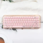 Miffy crystal jelly keycaps set in pastel pink and white, side-engraved, shown from various translucent angles.
