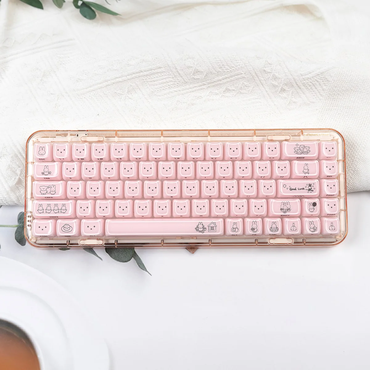 Miffy crystal jelly keycaps set in pastel pink and white, side-engraved, shown from various translucent angles.