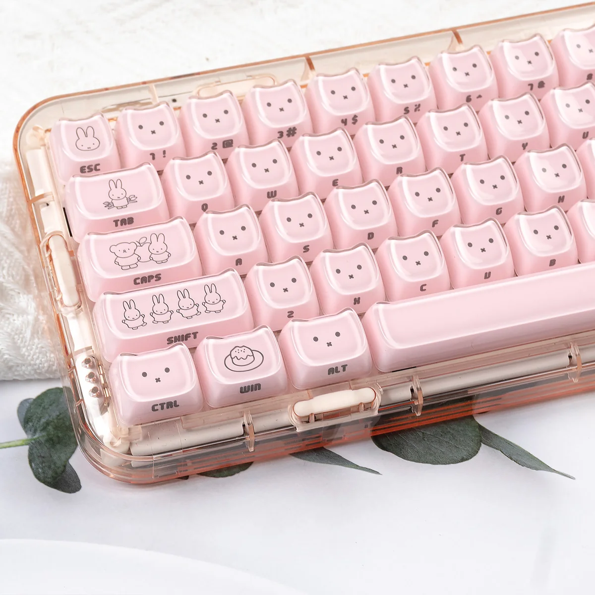 Pink Miffy crystal jelly keycap set, side-engraved with the iconic Miffy rabbit, offering a translucent and playful look for custom keyboards.
