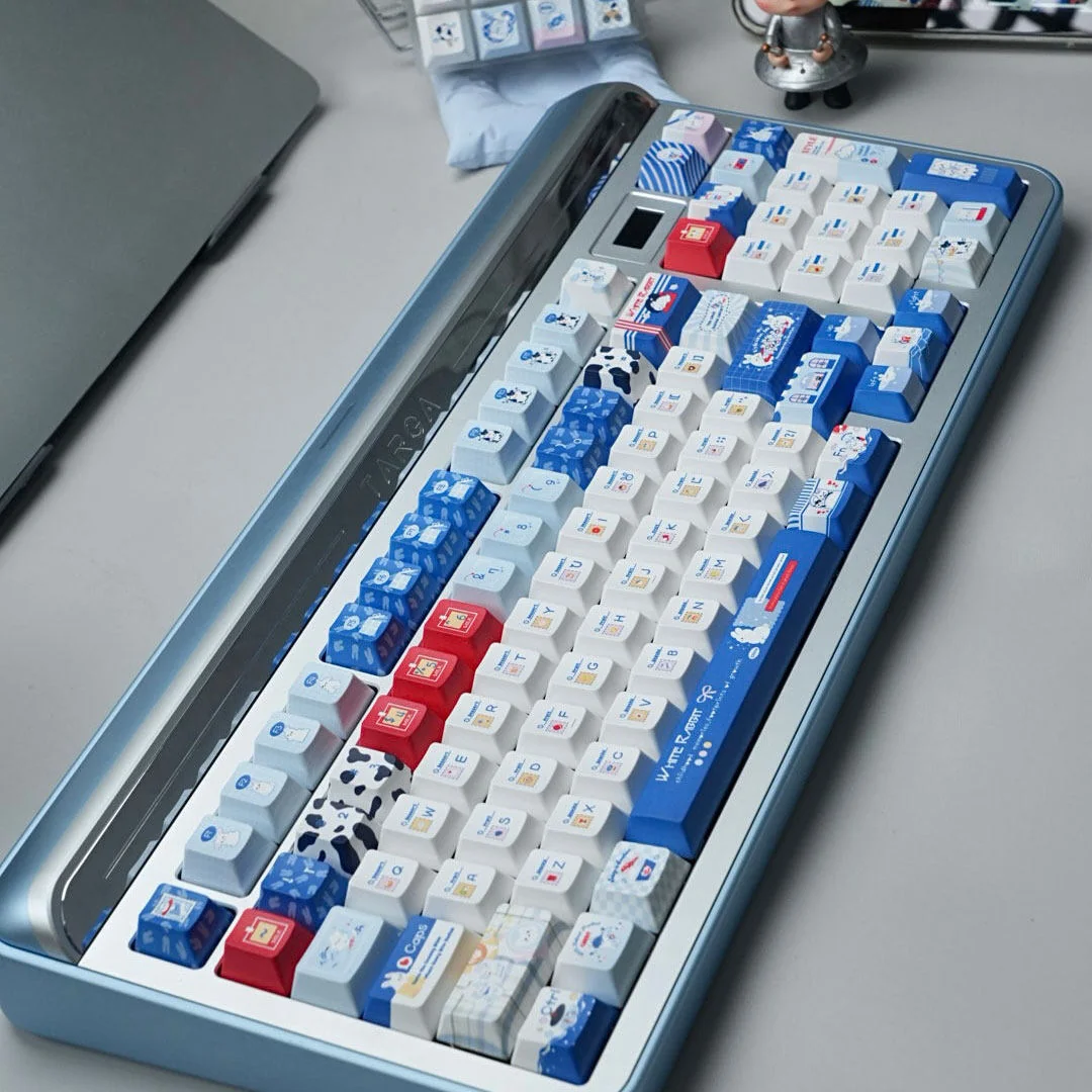 Adorable Milk Rabbit PBT dye-sub keycaps set. Multiple views reveal whimsical pastel pink and cream rabbit and candy designs, evoking sweet Shanghai charm design.