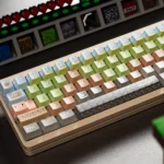 A collection of durable PBT Minecraft pixel art keycaps set displayed from various angles, featuring iconic green block-building game designs for a nostalgic design.