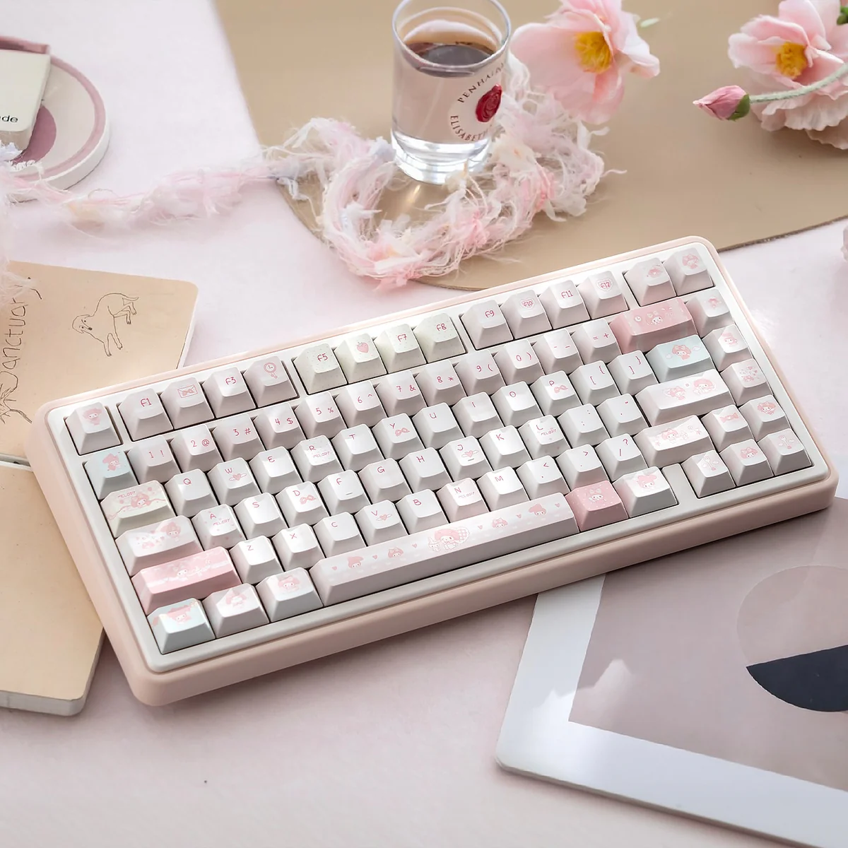 This cute pastel pink My Melody tri-mode silent mechanical keyboard is shown from various playful angles, highlighting its kawaii design and features.