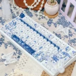 Exquisite 120-key Cherry profile Mysterious Garden PBT keycaps set, showcasing serene ancient flora and artistic dye-sublimated motifs.