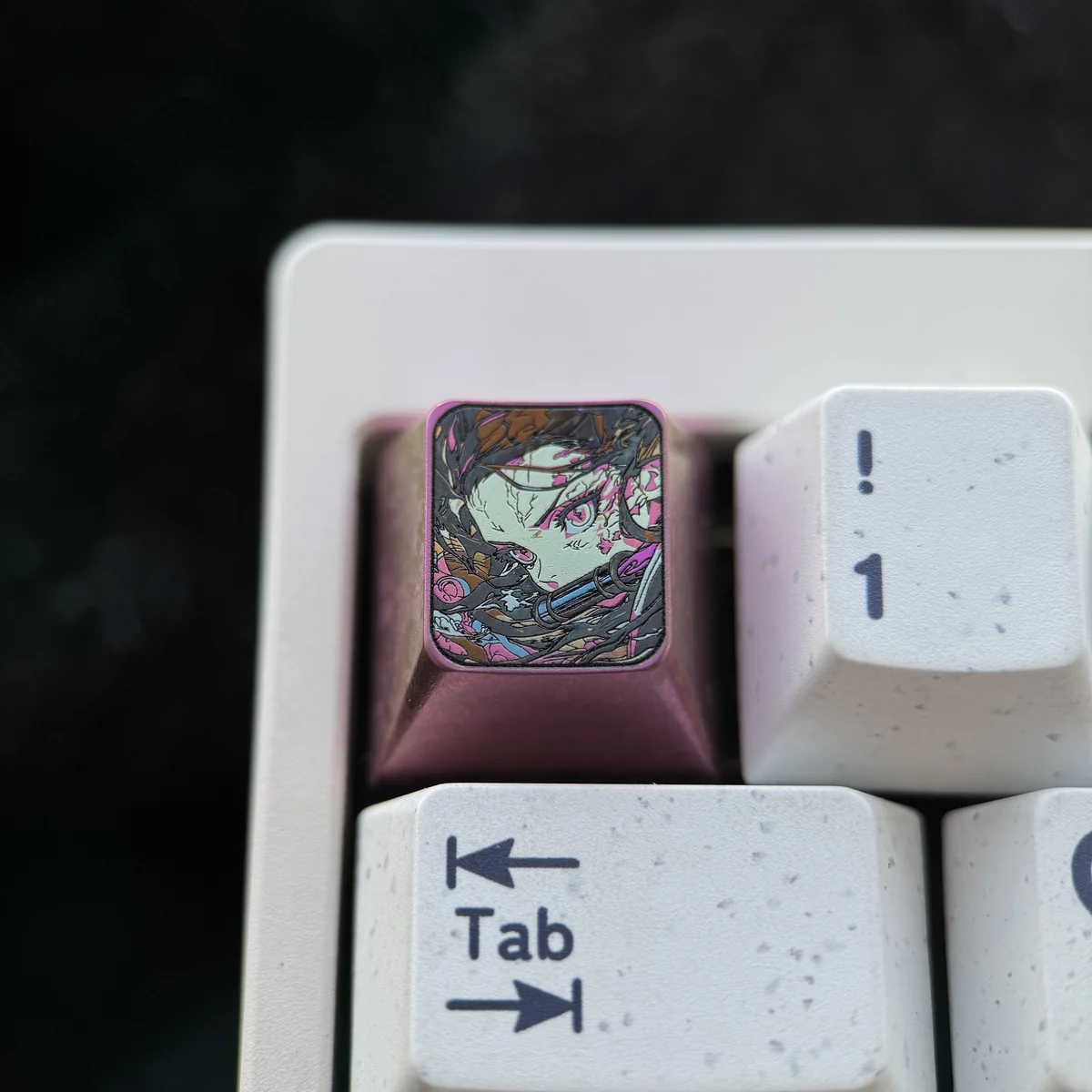 Premium handcrafted Nezuko Demon Slayer ESC keycap made from durable titanium, featuring intricate artisan detailing and iconic colors.