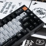 Detailed views of the Night Butterfly Iridescent PC Keycap Set, highlighting its luxurious pearlescent metallic sheen and deep, captivating hues.