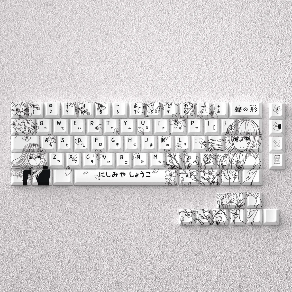 Shouko Nishimiya keycaps set from A Silent Voice, showcasing the exclusive delicate anime design in soft pastel colors from various angles, creating a serene design.