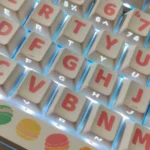 Side-engraved Keycaps set: Orchid Whisper PBT. Elegant shine-through legends, pastel orchid gradients. Durable PBT, serene art. All angles.