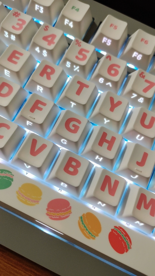 Side-engraved Keycaps set: Orchid Whisper PBT. Elegant shine-through legends, pastel orchid gradients. Durable PBT, serene art. All angles.