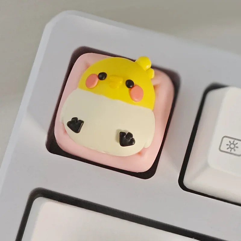 A gallery of angles for the whimsical handcrafted parakeet resin keycap, featuring its vibrant, intricately layered design and unique desktop charm.