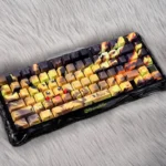 Vibrant yellow Iconic Pikachu PBT backlit keycap set displayed from various angles, showcasing luminous side-engraved legends for a playful look.