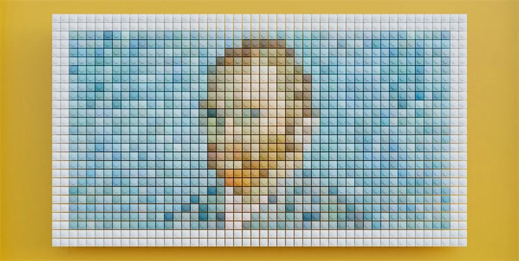 Multiple angles of the large Pixel Art Desk Mat, highlighting its vibrant, blocky artistic design and waterproof material on a modern workspace.