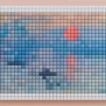 Artistic pixel art desk mat gallery displaying its large, waterproof surface and vibrant blocky designs from various perspectives.